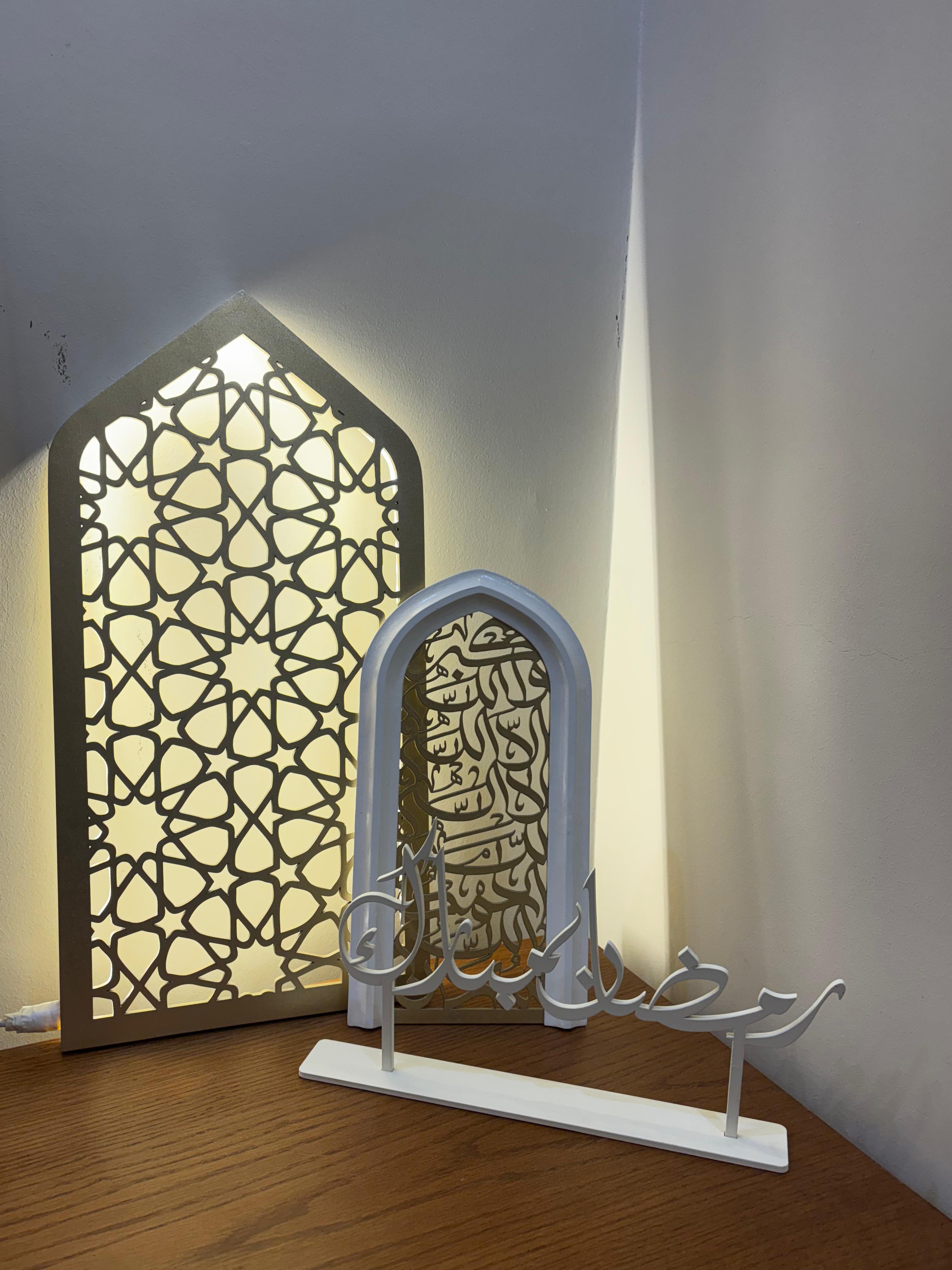 Decorative arches with intricate patterns on a wooden floor.